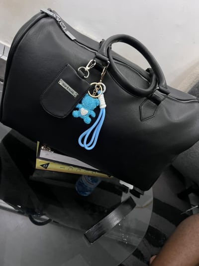Women’s Black Duffel handbag with Decorative Charm