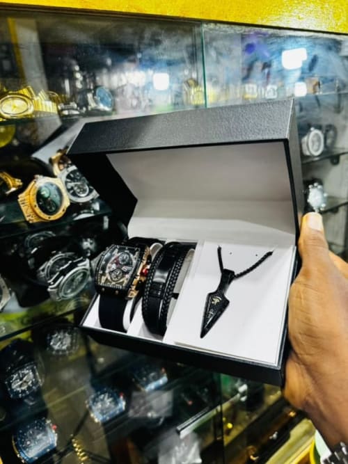 Curren, Poedegar , and Cartier watch set