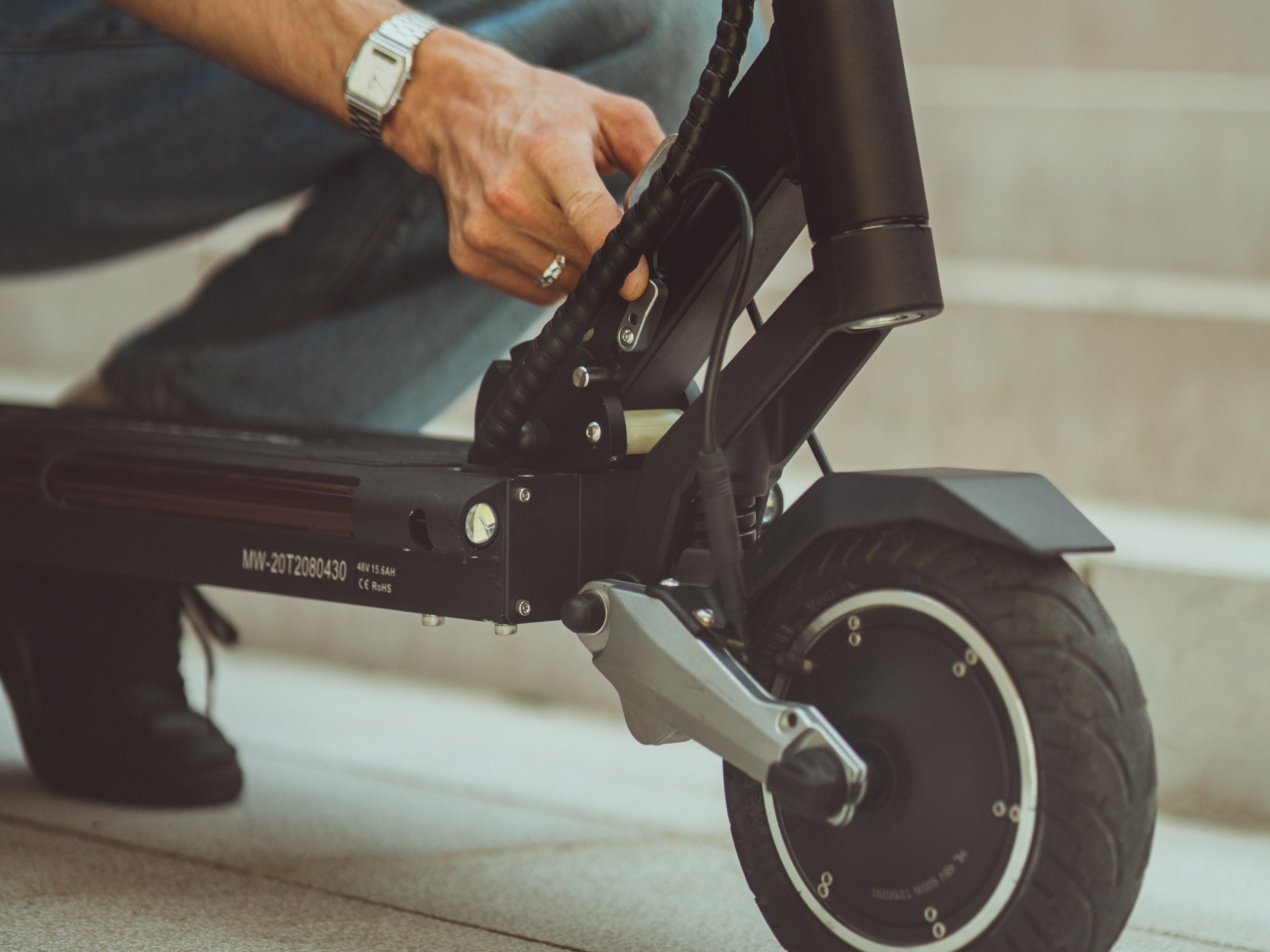 checking front wheel electric scooter