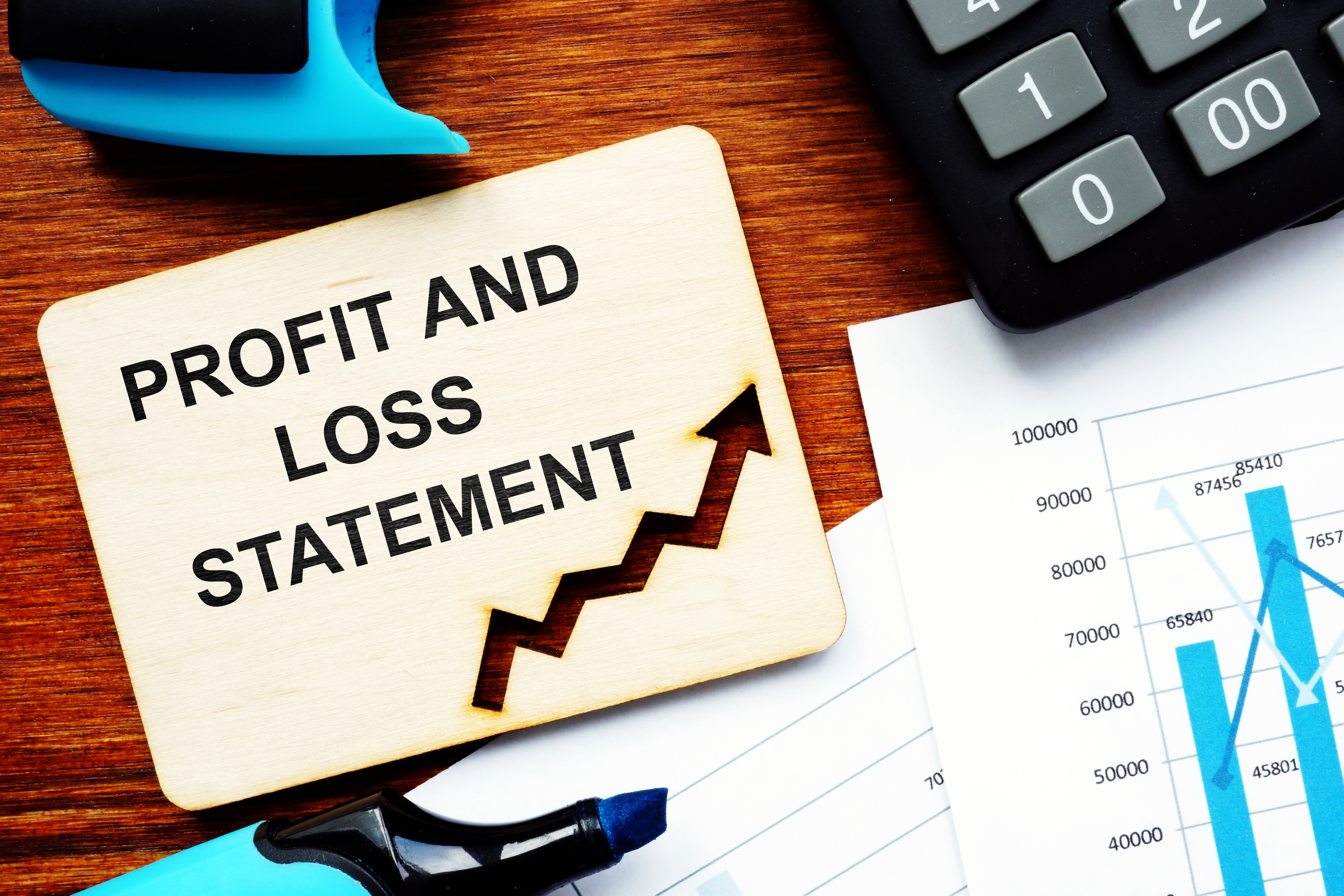 CPA reviewing a profit and loss statement with a business owner — P&L only mortgage Oregon California