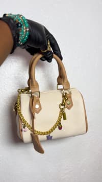 Women's Chic Cream & Tan Mini Duffle Handbag with Gold Chain & Adorable Charms - Stylish Crossbody Shoulder Bag for Everyday Elegance - View 1