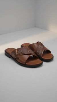 Men's Elegant Brown Leather Crossover Sandals | Monogram Strap Design & Gold Accent | Stylish & Comfortable Designer Slides - View 1
