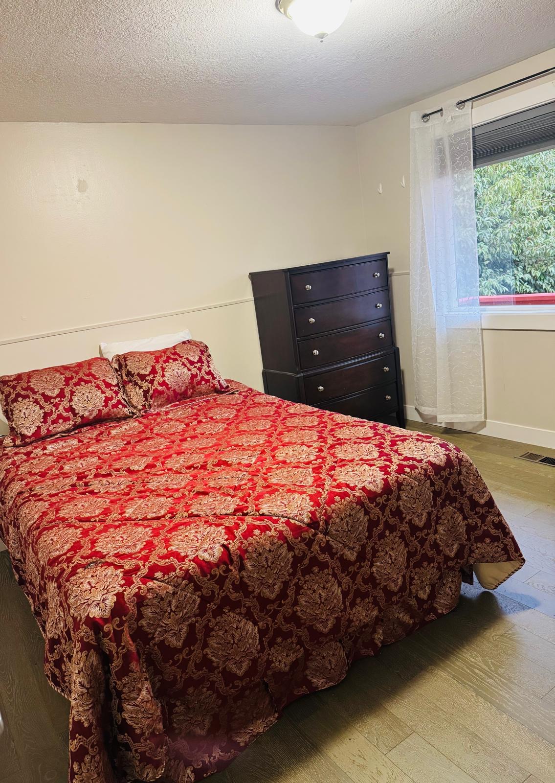 Neatly arranged bedroom at Bramig Adult Care Home promoting comfort and care.