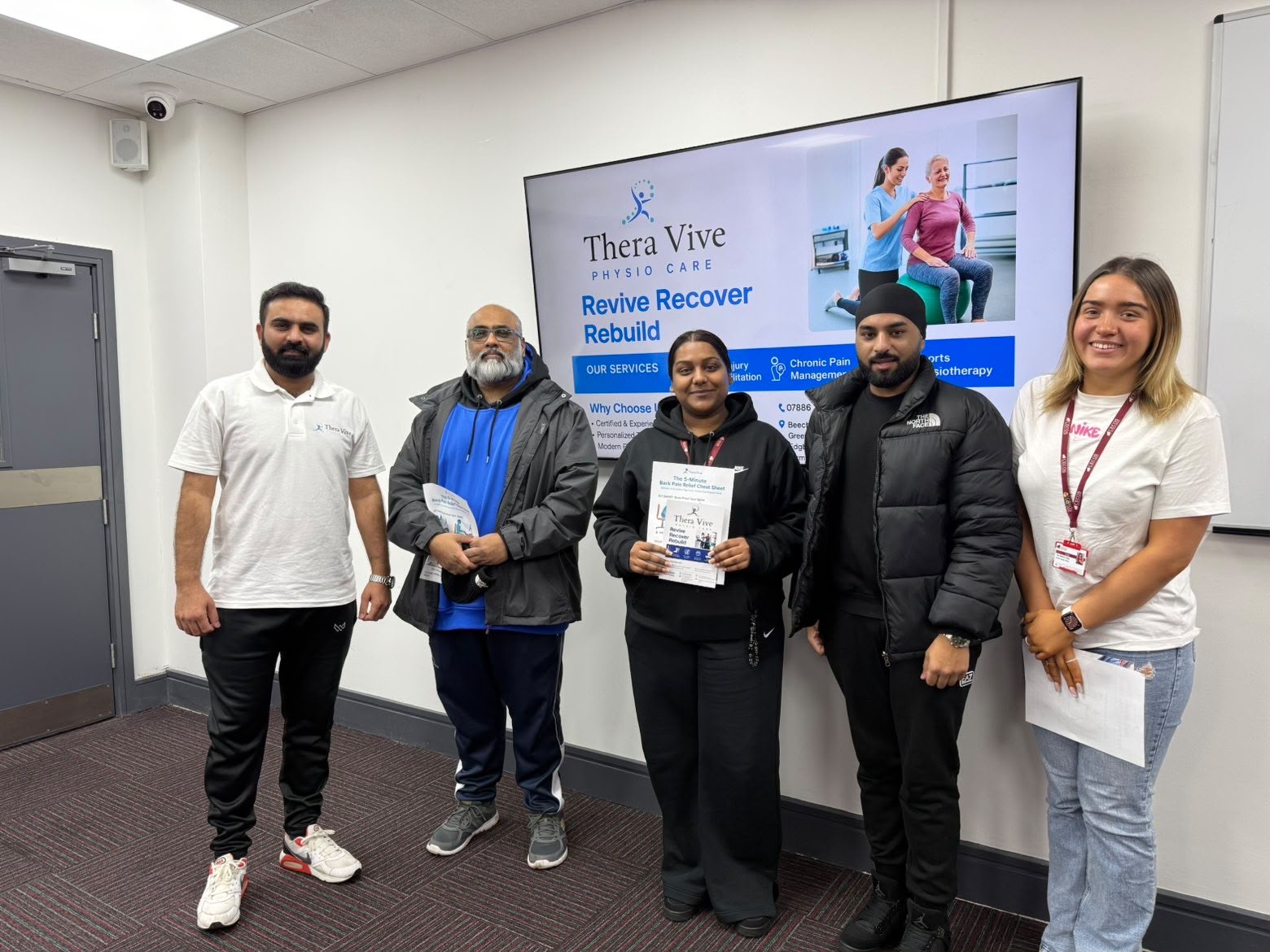 The TheraVive PhysioCare team at a free back pain awareness workshop held at a Birmingham college