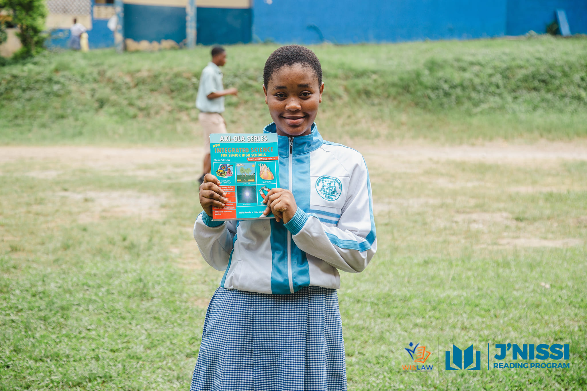 Female student holding a textbook