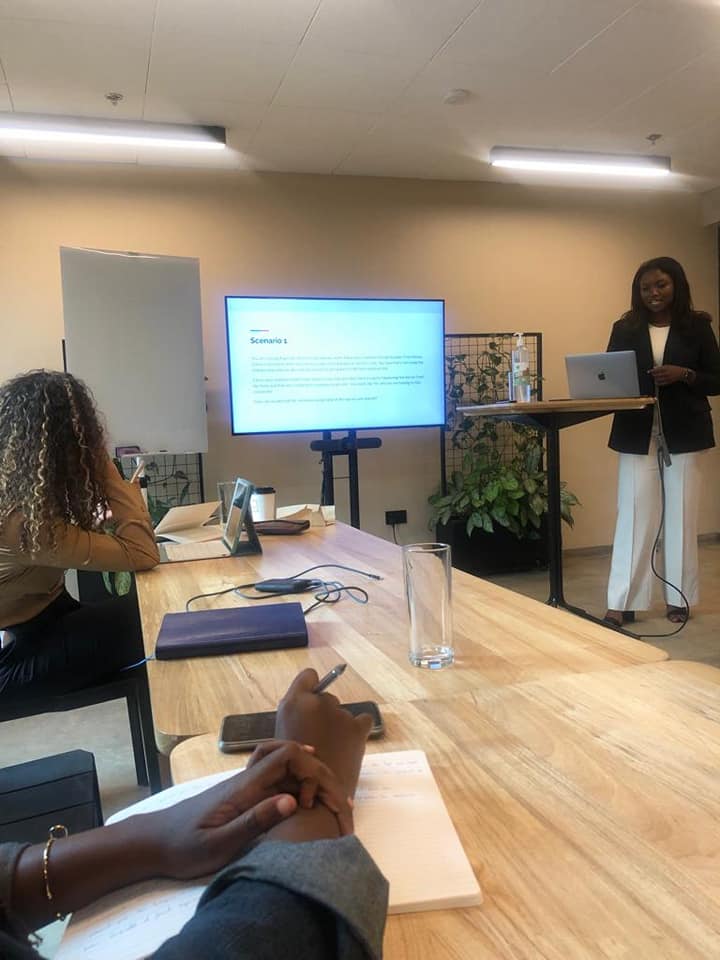 Lawrencia presenting donated books