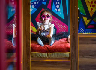A young girl enjoying herself in The Rockstar, Book your holiday now! image