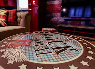 The living room table at one of our exclusive accommodations, The Rockstar. Book your holiday now! image
