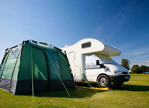 A tent and tourer in one of our holiday parks.
