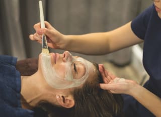 A woman enjoying a spa experience at Retallack Resort, Cornwall. image