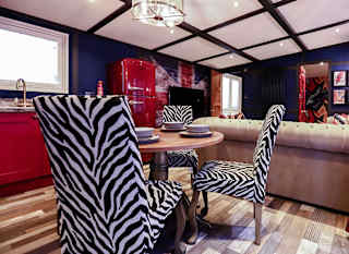 The dining area of one of our exclusive accommodations, The Rockstar. Book your holiday now! image