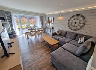 The lounge area of our stunning holiday home at The Lakes Rookley, the Island Cottage. image