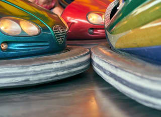 Two multi-colour bumper cars. image
