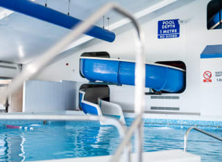 Indoor pool with flume image