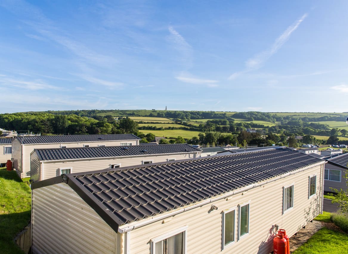 An exterior shot of our beautiful caravans featuring the stunning Isle of Wight views. image