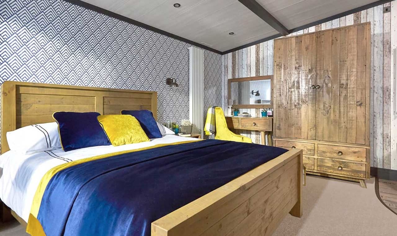 The double bedroom of one of our exclusive accommodations, The TriBeCa. Book your holiday now! image