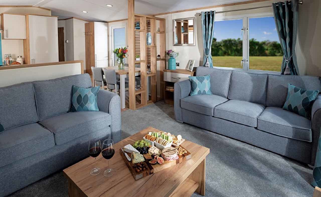 The lounge area of our bright and spacious luxury static caravan at St Helens holiday park. The perfect way to stay. image