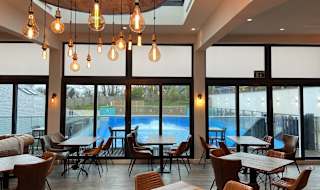 Our Lookout Bar and Eatery interior views overlooking the Flow Rider.