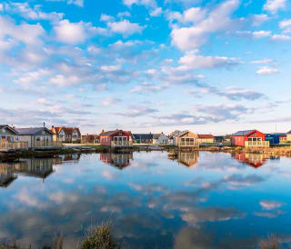 Holiday lodges looking out to a lake at The Bay Filey, Yorkshire, Away Resorts.