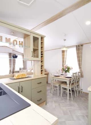 The kitchen area of our bright and spacious Luxury static caravan. The perfect way to stay!