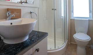 The bathroom of our Exclusive Rooftop Lodge. Book your holiday now! image