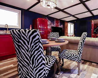 The dining area of one of our exclusive accommodations, The Rockstar. Book your holiday now!