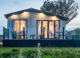 The exterior of one of our holiday homes at The Lakes Rookley in the Isle of Wight. image