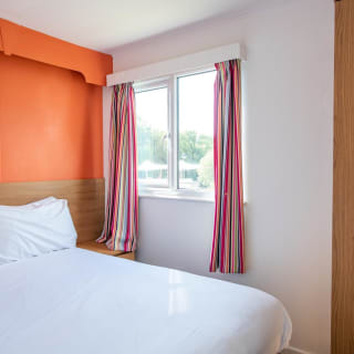 Comfortable double bed with pillows & linen included