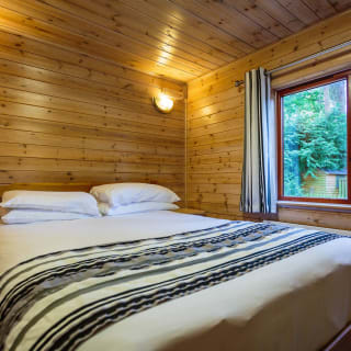 Comfortable double bed with pillows & linen included