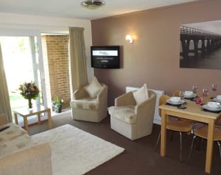 The lounge area of our bright and spacious superior chalet. The perfect way to stay.