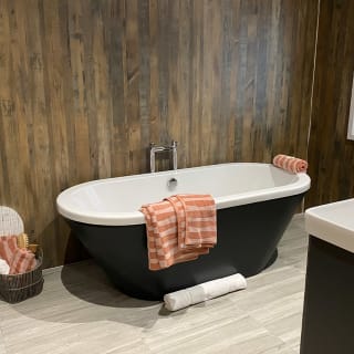 Rolltop bathtub in spacious bathroom