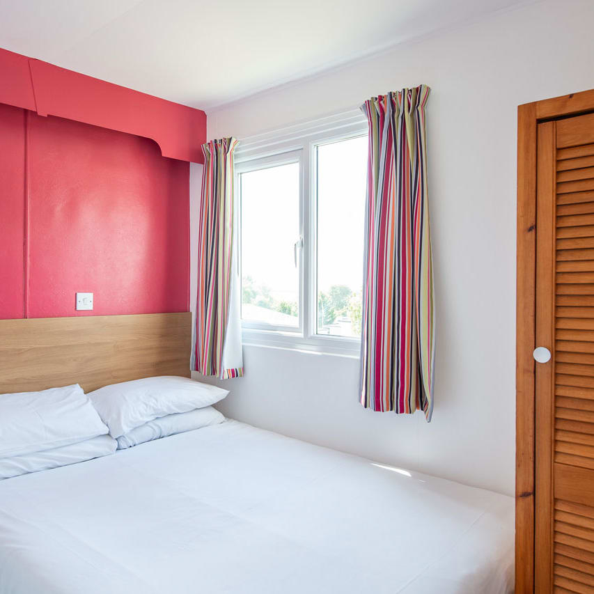 Comfortable double bed with pillows & linen included