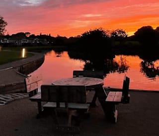 The beautiful sunset orange sky across our Mill Rythe Holiday Park.