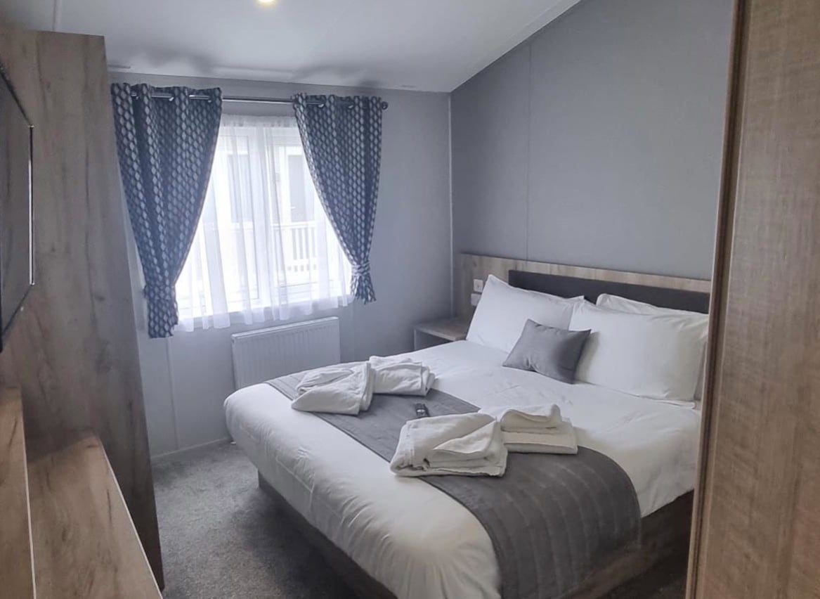 The double bedroom of one of our exclusive accommodations, The Seaview Lodge. Book your holiday now! image