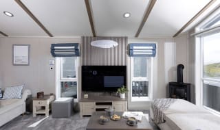 The living area of one of our spacious static caravans in St Ives. Book your holiday now! image
