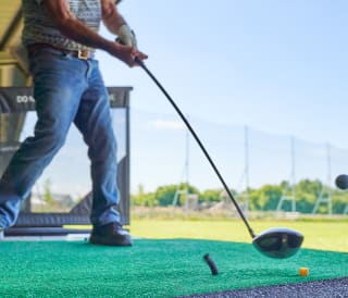 A man on the driving range at Appletree.