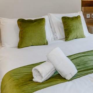 Comfy bed in the master bedroom