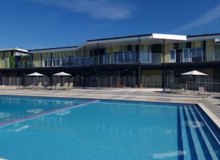 A sunny day looking out onto the heated outdoor swimming pool at our holiday park, Cleethorpes Pearl, Lincolnshire. image