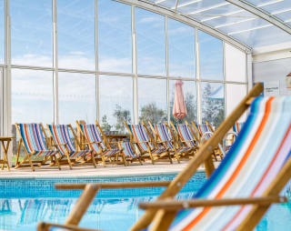 A close up image of a deck chair inside our indoor swimming pool at Mersea Island.