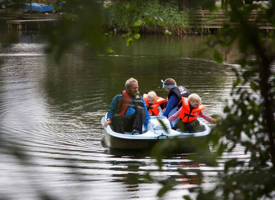 Family enjoying a pedalo session at our Tattershall Lakes Country Park, Lincolnshire. image