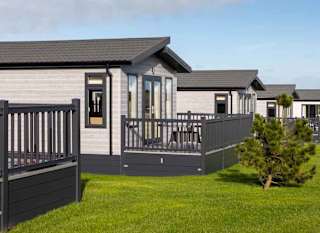 Our lodges we have at Newperran Bay holiday park. image