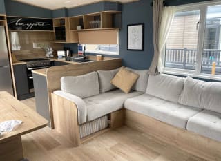 The living area of one of our spacious accommodation, The Oakwood. Book your holiday now! image