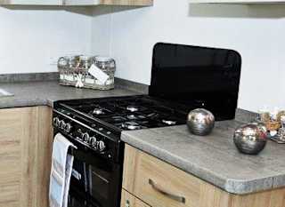 The kitchen area of our bright and spacious luxury static caravan. The perfect way to stay. image