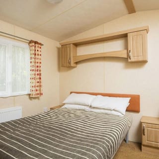 Comfortable double bed with pillows & linen included