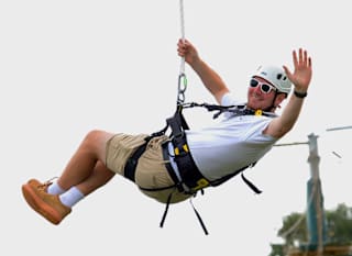 A man enjoying the zip wire activity at Tattershall Lakes. image