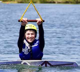 Young boy wakeboarding at our Retallack Resort and Spa, Cornwall. image