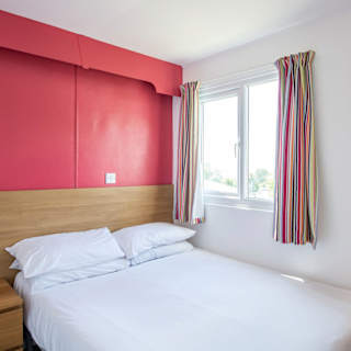 Comfortable double bed with pillows & linen included