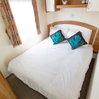 Comfortable double bed with pillows & linen included