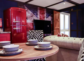 The dining area of one of our exclusive accommodations, The Rockstar. Book your holiday now! image