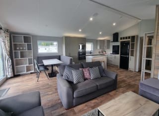 The living and lounge area of one of our exclusive accommodations, The Seaview Lodge. Book your holiday now! image
